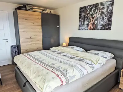 Ein Bett oder Betten in einem Zimmer der Unterkunft Apartment Les Essampilles 25 by Interhome
