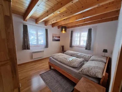 Ein Bett oder Betten in einem Zimmer der Unterkunft Ferienhaus Andrea AD0