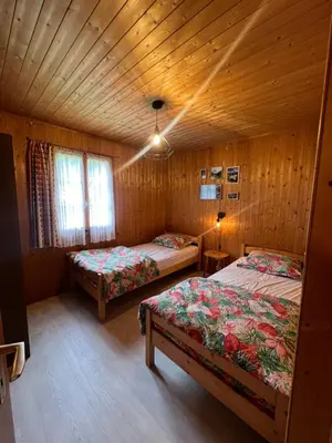 Ein Bett oder Betten in einem Zimmer der Unterkunft Chalet Les Rocailles