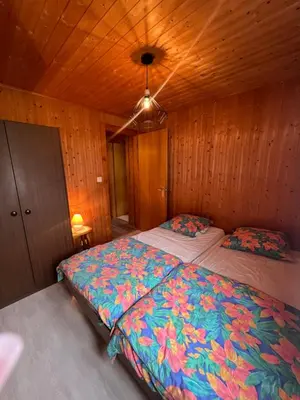 Ein Bett oder Betten in einem Zimmer der Unterkunft Chalet Les Rocailles