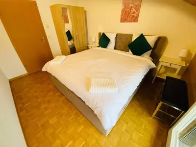 Ein Bett oder Betten in einem Zimmer der Unterkunft Lake View Residence