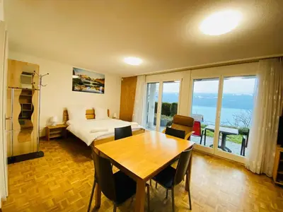 Ein Bett oder Betten in einem Zimmer der Unterkunft Lake View Residence
