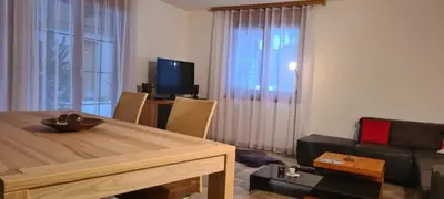 Ein Sitzbereich in der Unterkunft Komfortabel, Perfekte Lage, neue Wohnung, gratis P