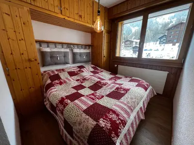 Ein Bett oder Betten in einem Zimmer der Unterkunft Zinal à 80m des remontées mécaniques