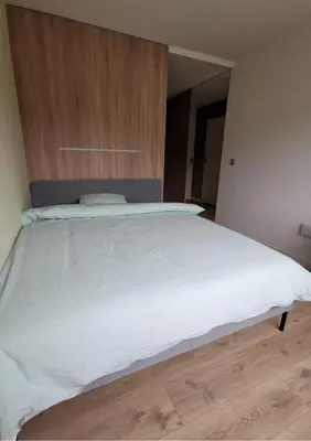 Ein Bett oder Betten in einem Zimmer der Unterkunft smallville