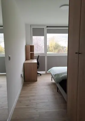 Ein Bett oder Betten in einem Zimmer der Unterkunft smallville