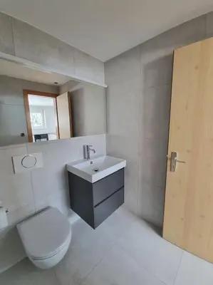 Ein Badezimmer in der Unterkunft Tarbey 39 Toplage an der Bergbahn Moderne Ferienwohnung mit grosser Panoramaterrasse