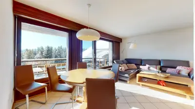 Ein Sitzbereich in der Unterkunft Lovely apartment with a view - accessible by skis