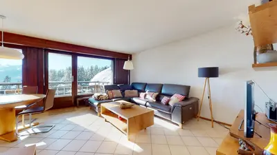 Ein Sitzbereich in der Unterkunft Lovely apartment with a view - accessible by skis