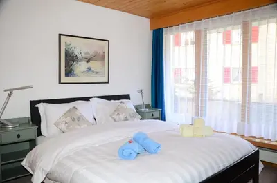 Ein Bett oder Betten in einem Zimmer der Unterkunft Charming and cosy apartment (sleeps 4-6 people) in a beautiful mountain village