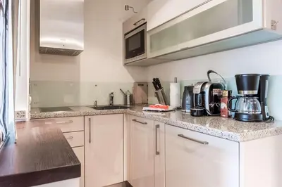 Küche/Küchenzeile in der Unterkunft Apartment Alpenrose 2.5 mit Mitbenutzung SPA & Wellness - GRIWA RENT AG
