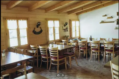 Ein Restaurant oder anderes Speiselokal in der Unterkunft Berghotel Gasterntal