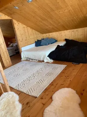 Ein Bett oder Betten in einem Zimmer der Unterkunft Chalet , Thyon Les Collons, 4 Vallées