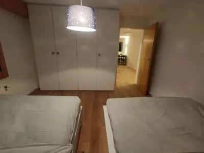 Ein Bett oder Betten in einem Zimmer der Unterkunft Apartment Lenk Unique by Interhome