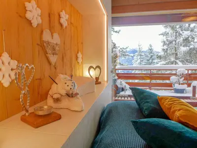 Ein Sitzbereich in der Unterkunft Apartment Résidence Byblos 11 by Interhome
