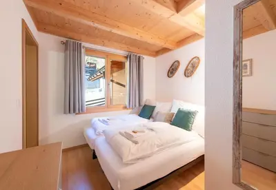 Ein Bett oder Betten in einem Zimmer der Unterkunft Racers Retreat 10