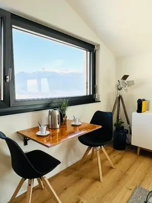 Ein Sitzbereich in der Unterkunft Chambre double privative et indépendante