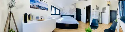 Ein Sitzbereich in der Unterkunft Chambre double privative et indépendante