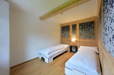 Ein Bett oder Betten in einem Zimmer der Unterkunft Bellevue Hotel & Apartments