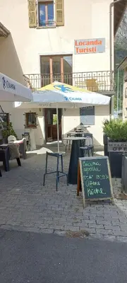 Ein Restaurant oder anderes Speiselokal in der Unterkunft Nuova Locanda Turisti