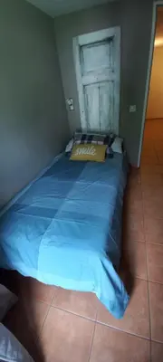 Ein Bett oder Betten in einem Zimmer der Unterkunft Nuova Locanda Turisti