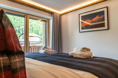 Ein Bett oder Betten in einem Zimmer der Unterkunft Riverside 2nd Floor South