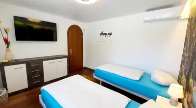 Ein Bett oder Betten in einem Zimmer der Unterkunft Luxuriöse Villa Romantica