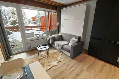 Ein Sitzbereich in der Unterkunft Joli studio Crans-Montana