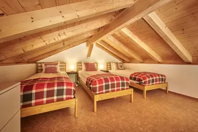 Ein Bett oder Betten in einem Zimmer der Unterkunft Chalet Lauterbrunnen
