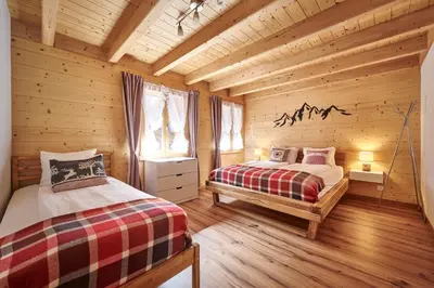 Ein Bett oder Betten in einem Zimmer der Unterkunft Chalet Lauterbrunnen