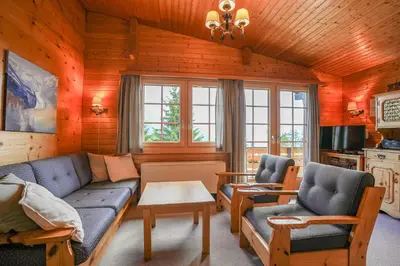 Ein Sitzbereich in der Unterkunft Chalet Lieke Apartment