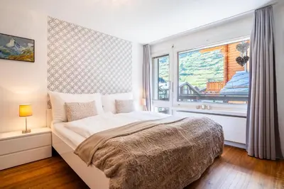 Ein Bett oder Betten in einem Zimmer der Unterkunft Amara Apartment by HomeFlow