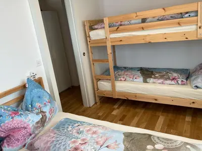 Ein Bett oder Betten in einem Zimmer der Unterkunft Chalet Sonne