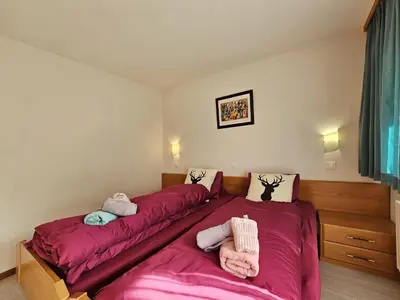 Ein Bett oder Betten in einem Zimmer der Unterkunft Azurit Ski-in, ski-out