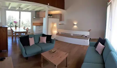 Ein Sitzbereich in der Unterkunft Ferienwohnung Träumli