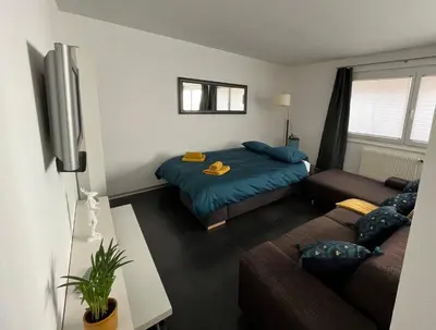 Ein Bett oder Betten in einem Zimmer der Unterkunft Appartement Tourbillon centre-ville