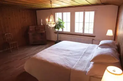 Ein Bett oder Betten in einem Zimmer der Unterkunft Marianne's Rustic