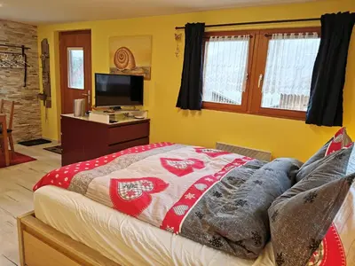 Ein Bett oder Betten in einem Zimmer der Unterkunft Studio mit traumhafter Aussicht