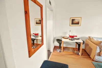Ein Sitzbereich in der Unterkunft Studio chaleureux et paisible