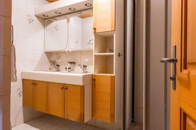Ein Badezimmer in der Unterkunft Chalet Lienzhubel - GRIWA RENT AG
