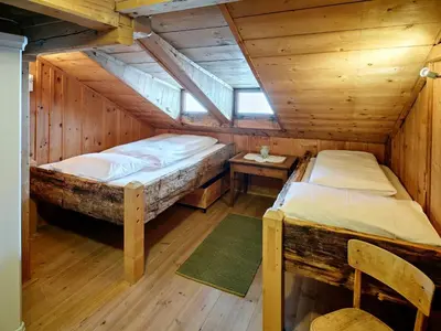 Ein Bett oder Betten in einem Zimmer der Unterkunft Gruppenwohnung Allegra