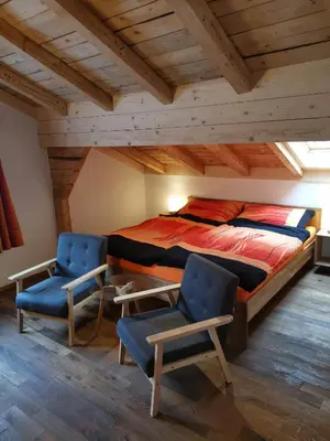 Ein Bett oder Betten in einem Zimmer der Unterkunft Chalet-Daheim-Fiesch 3,5-Zimmerwohnung