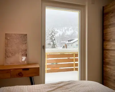 Ein Bett oder Betten in einem Zimmer der Unterkunft Spacious 3 Room Apartment - Family-Friendly - Central Leukerbad - Great Views