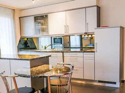 Küche/Küchenzeile in der Unterkunft Apartment Résidence Sans Souci by Interhome