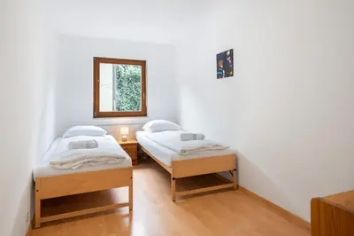 Ein Bett oder Betten in einem Zimmer der Unterkunft Between Lakes Apartments - 58