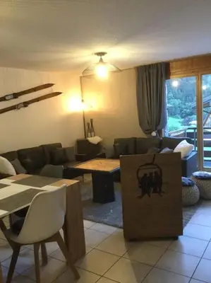 Ein Sitzbereich in der Unterkunft Magnifique appartement de montagne