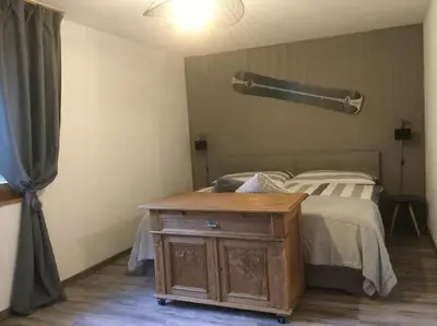 Ein Bett oder Betten in einem Zimmer der Unterkunft Magnifique appartement de montagne