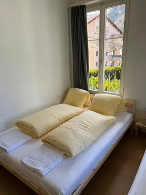 Ein Bett oder Betten in einem Zimmer der Unterkunft Apartment ROSY