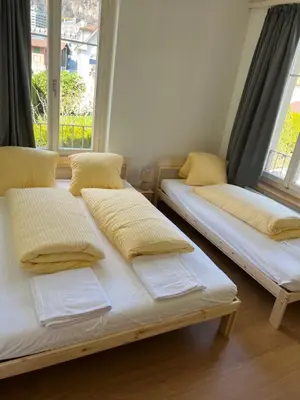 Ein Bett oder Betten in einem Zimmer der Unterkunft Apartment ROSY