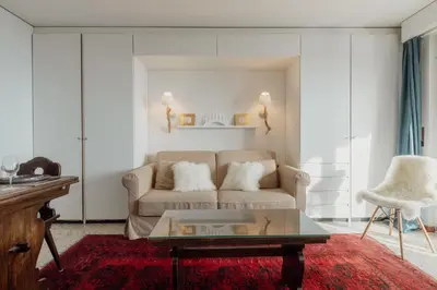 Ein Sitzbereich in der Unterkunft Logement avec vue spectaculaire sur les montagnes